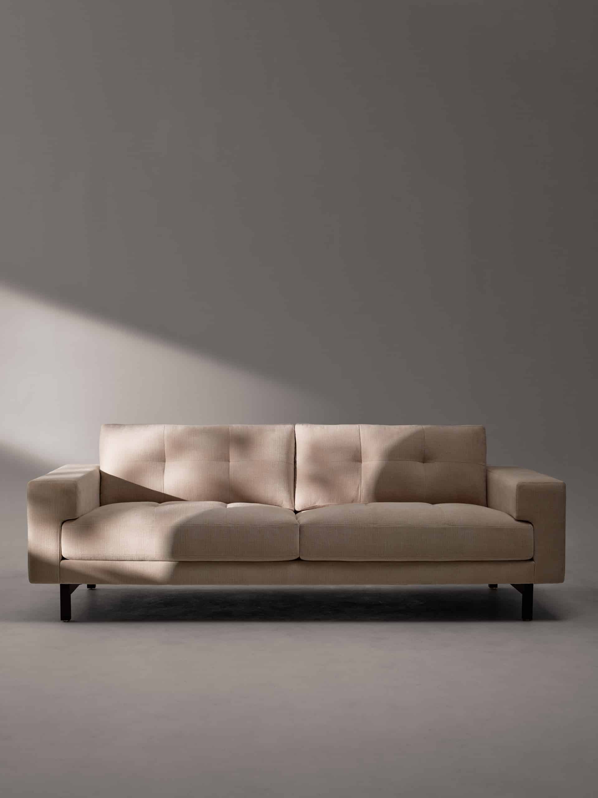 Lawson sofa with tufted seat and back and high legs