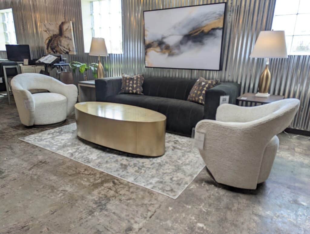 Roma Sofa with Becky Swivel Chair at By Design Furniture + Interior Design